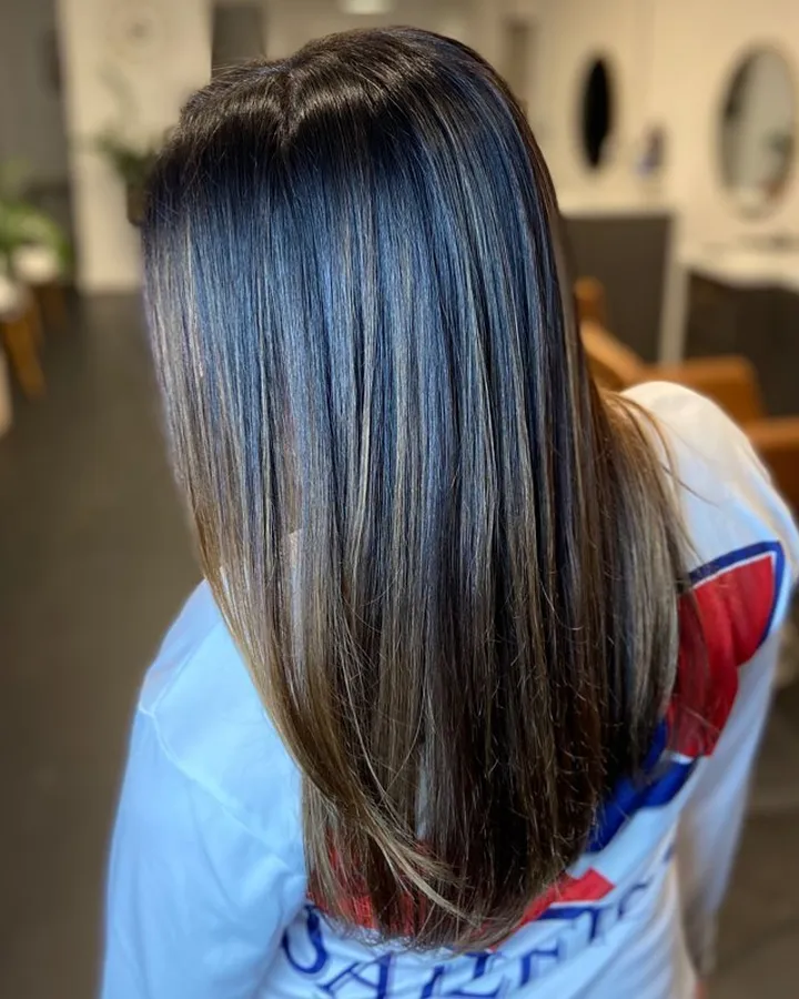 Glossy black, long and straight